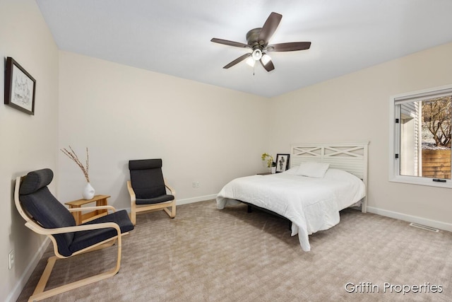 7834 Strawberry Ln NE, Belmont, MI 49306 - bedroom with visible vents, carpet floors, baseboards, and a ceiling fan