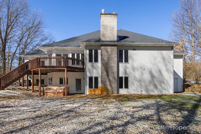 7834 Strawberry Ln NE, Belmont, MI 49306 - back of property featuring a deck and a chimney