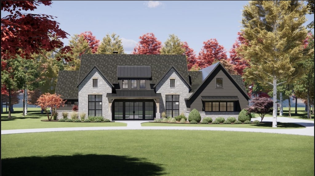 2742 S Custer Rd, Monroe, MI 48161 - exterior space with stone siding, metal roof, a standing seam roof, and a front yard
