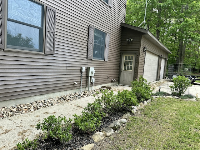 8440 S Felch Ave, Newaygo, MI 49337 - view of home's exterior featuring a garage