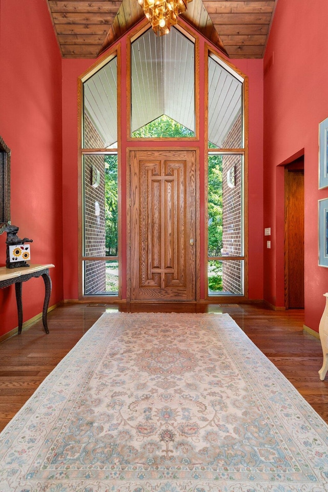 4923 Hickory Hill Rd, Ann Arbor, MI 48105 - entryway featuring wood ceiling, high vaulted ceiling, baseboards, and wood finished floors