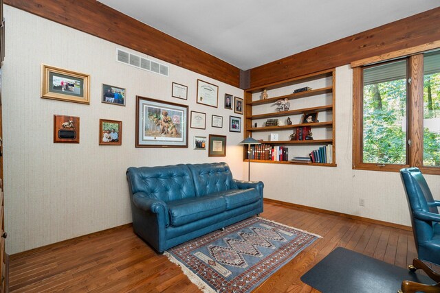 4923 Hickory Hill Rd, Ann Arbor, MI 48105 - sitting room with hardwood / wood-style floors, baseboards, visible vents, and wallpapered walls