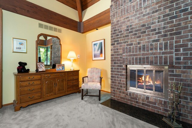 4923 Hickory Hill Rd, Ann Arbor, MI 48105 - sitting room with baseboards, visible vents, a brick fireplace, and light carpet