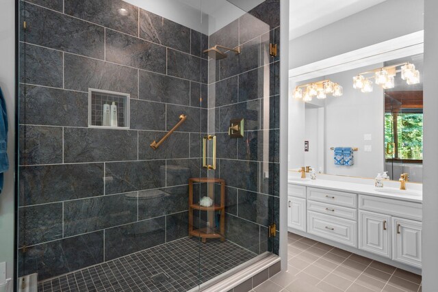 4923 Hickory Hill Rd, Ann Arbor, MI 48105 - full bath with double vanity, a sink, tile patterned flooring, and a shower stall