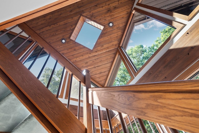 4923 Hickory Hill Rd, Ann Arbor, MI 48105 - staircase featuring a high ceiling and a skylight