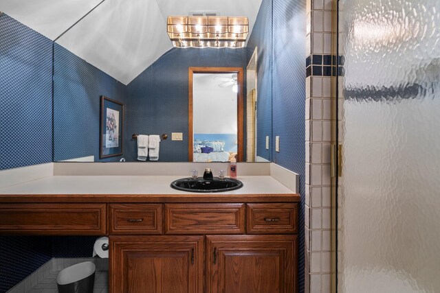 4923 Hickory Hill Rd, Ann Arbor, MI 48105 - bathroom featuring visible vents, an enclosed shower, and vanity