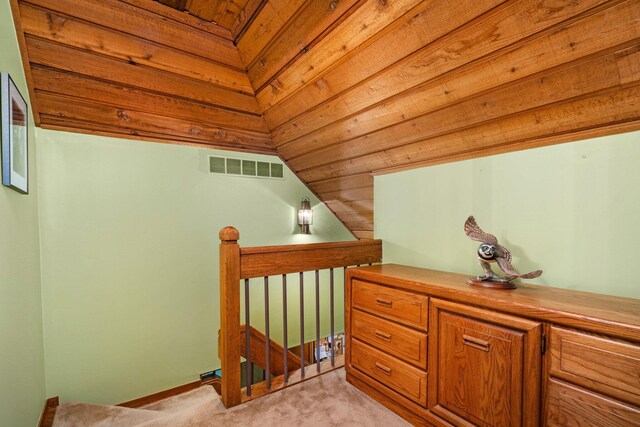 4923 Hickory Hill Rd, Ann Arbor, MI 48105 - interior space with light carpet, visible vents, and an upstairs landing
