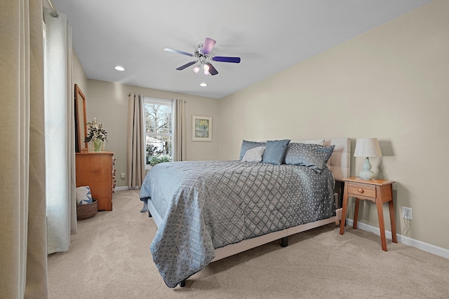 carpeted bedroom with a ceiling fan, recessed lighting, and baseboards