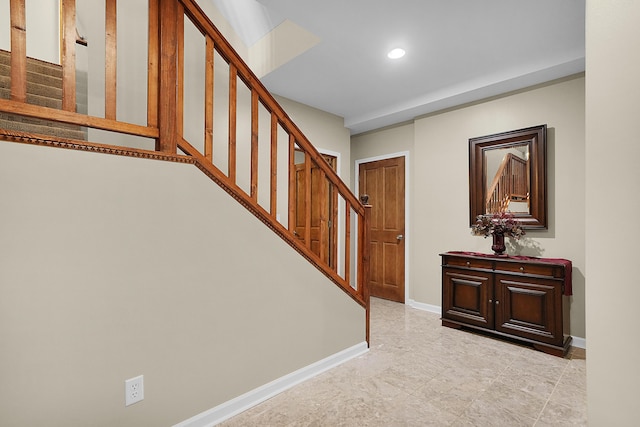 interior space with recessed lighting, stairway, and baseboards