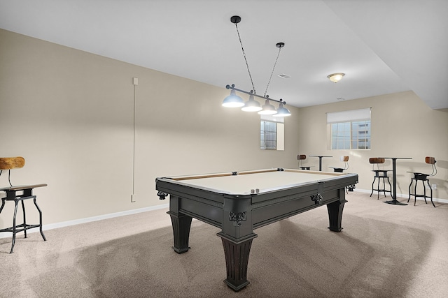 recreation room with light carpet, billiards, and baseboards