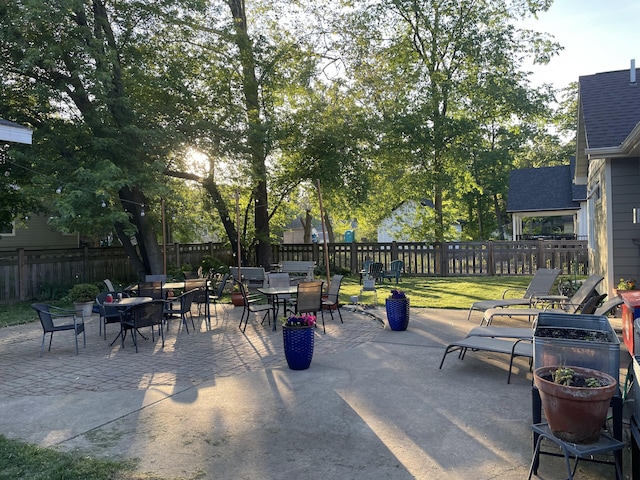 view of patio / terrace with outdoor dining area and a fenced backyard