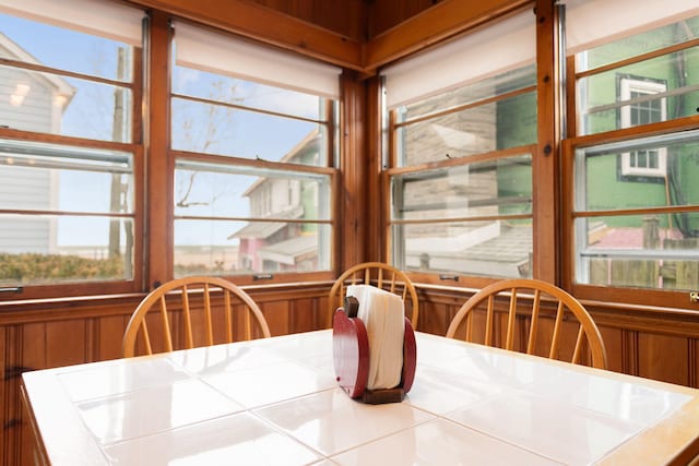 36.5 Lake Shore Dr, South Haven, MI 49090 - dining room with plenty of natural light and wooden walls