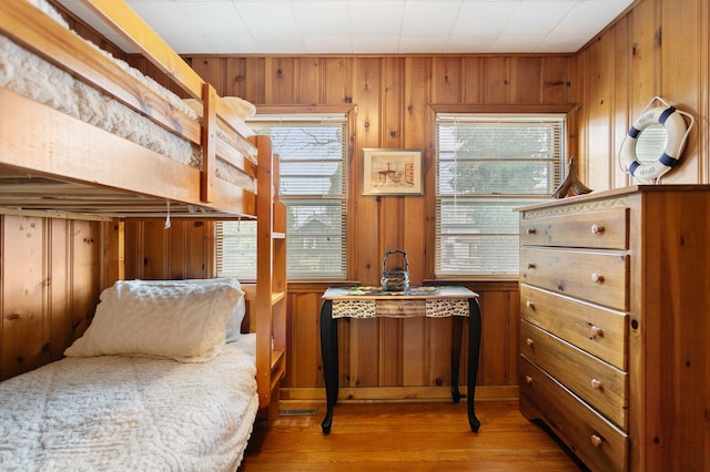 36.5 Lake Shore Dr, South Haven, MI 49090 - bedroom featuring wood walls and wood finished floors