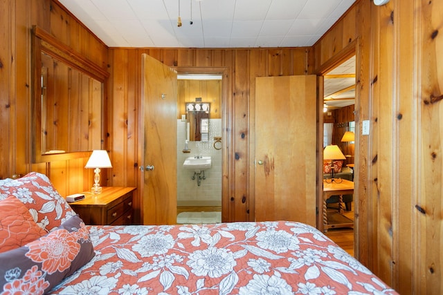 36.5 Lake Shore Dr, South Haven, MI 49090 - bedroom with wood walls and ensuite bath