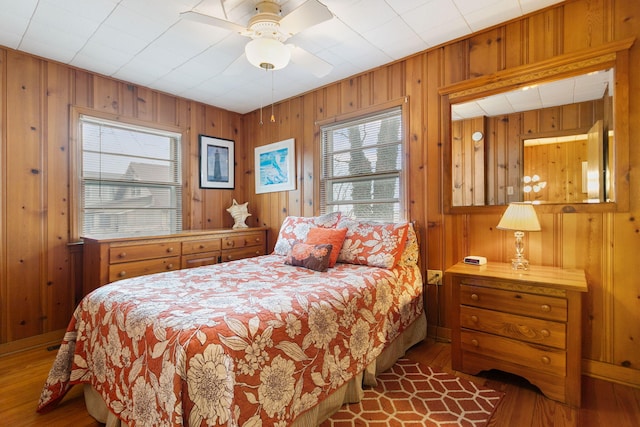 36.5 Lake Shore Dr, South Haven, MI 49090 - bedroom featuring wooden walls and wood finished floors