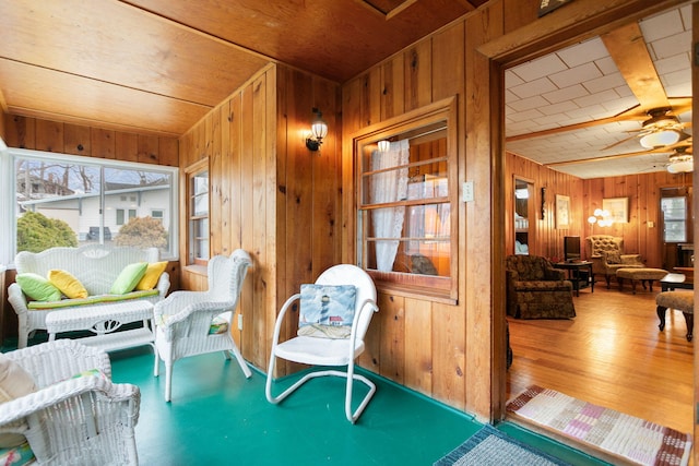 36.5 Lake Shore Dr, South Haven, MI 49090 - sitting room with a ceiling fan, wood ceiling, wooden walls, and wood finished floors