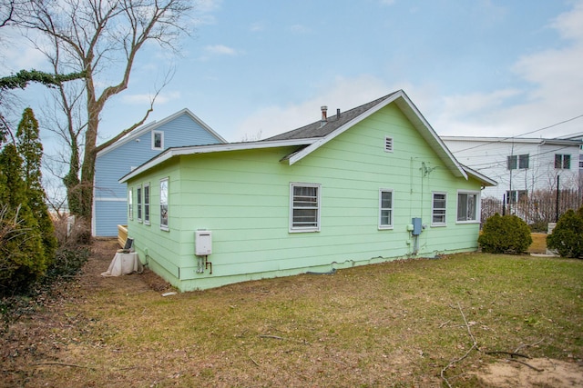 36.5 Lake Shore Dr, South Haven, MI 49090 - view of side of home featuring a yard