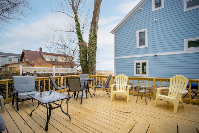 36.5 Lake Shore Dr, South Haven, MI 49090 - wooden deck featuring outdoor dining space