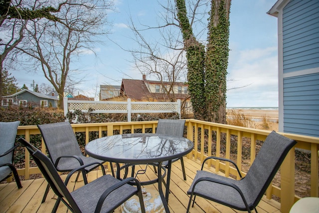 36.5 Lake Shore Dr, South Haven, MI 49090 - wooden deck with fence and outdoor dining space