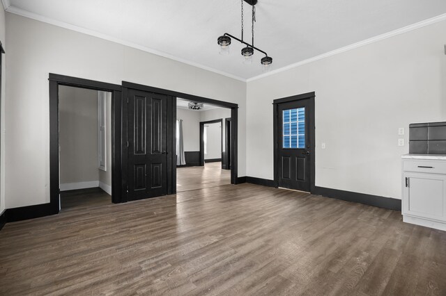 816 7th St, Three Rivers, MI 49093 - interior space with baseboards, wood finished floors, and crown molding