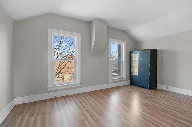 816 7th St, Three Rivers, MI 49093 - bonus room with vaulted ceiling, wood finished floors, and baseboards