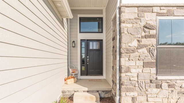 1303 Gallery Pointe Dr, Saline, MI 48176 - property entrance with stone siding