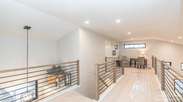 1303 Gallery Pointe Dr, Saline, MI 48176 - hallway featuring an upstairs landing, recessed lighting, and lofted ceiling