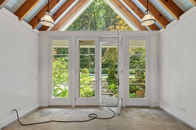 5716 E 1000 N, La Porte, IN 46350 - doorway with baseboards, lofted ceiling with beams, wood ceiling, and stone tile flooring