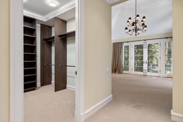 5716 E 1000 N, La Porte, IN 46350 - walk in closet with carpet and an inviting chandelier