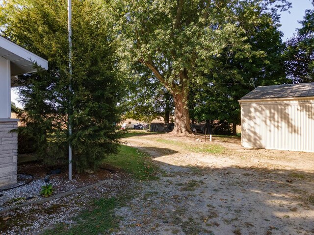 5844 S Scottdale Rd, Berrien Springs, MI 49103 - view of yard featuring an outdoor structure