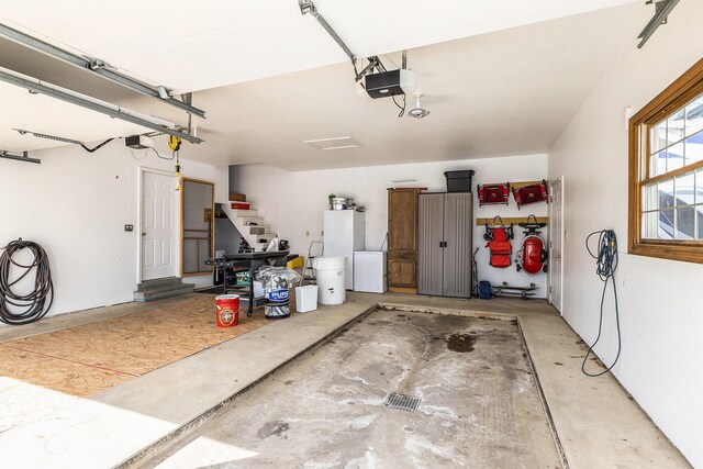 garage featuring a garage door opener