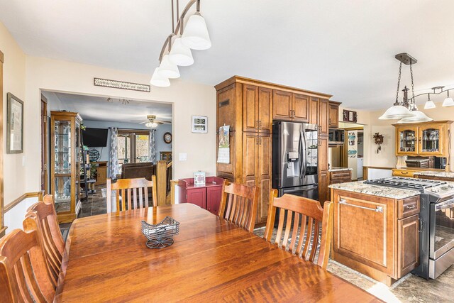 dining room with ceiling fan