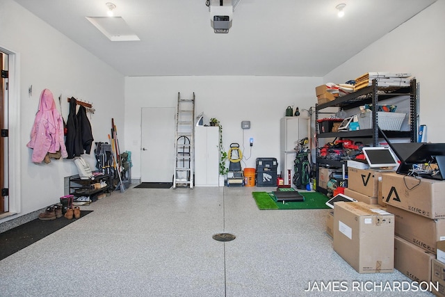 garage featuring a garage door opener