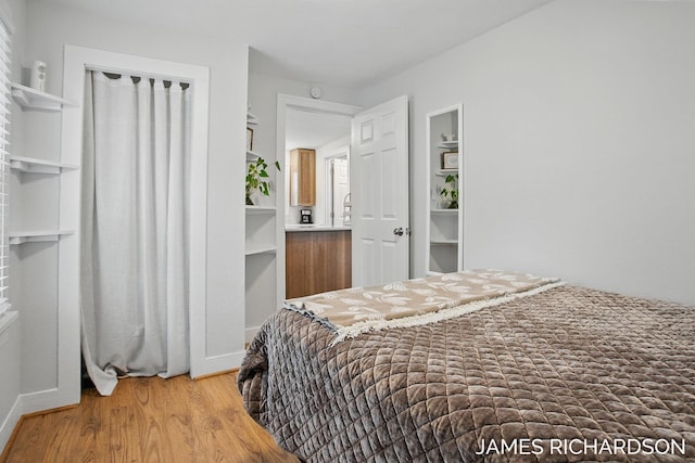 bedroom with light wood-style flooring