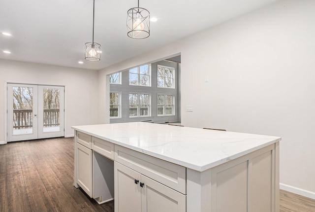 62711 Balk Rd, Sturgis, MI 49091 - kitchen featuring dark wood-style floors, baseboards, healthy amount of natural light, recessed lighting, and pendant lighting