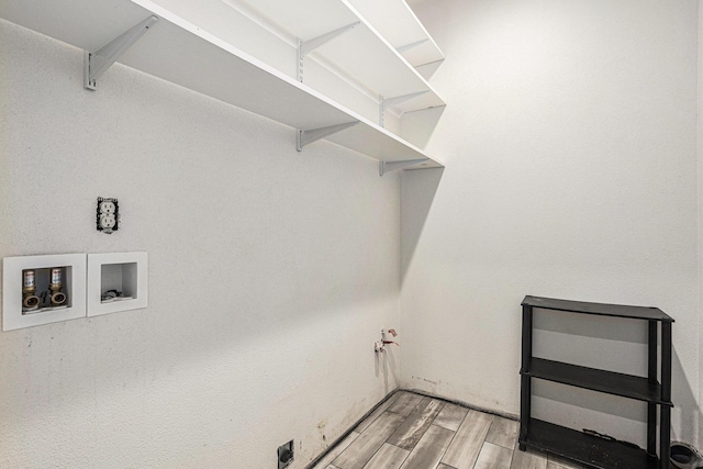 62711 Balk Rd, Sturgis, MI 49091 - laundry room featuring light wood-type flooring and hookup for a washing machine