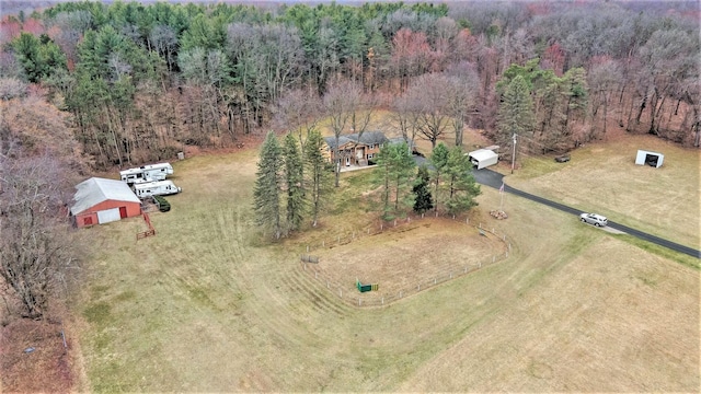 view of rural area with a heavily wooded area