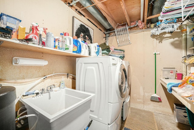 laundry area with washer and clothes dryer