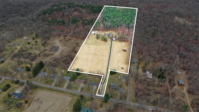 view of property location with property boundaries highlighted and a forest