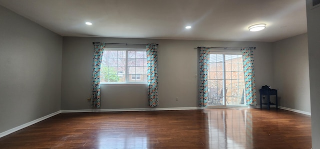 889 Kirts Blvd, Troy, MI 48084 - spare room with recessed lighting, baseboards, and wood finished floors