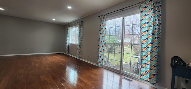 889 Kirts Blvd, Troy, MI 48084 - unfurnished room featuring baseboards, visible vents, recessed lighting, and wood finished floors