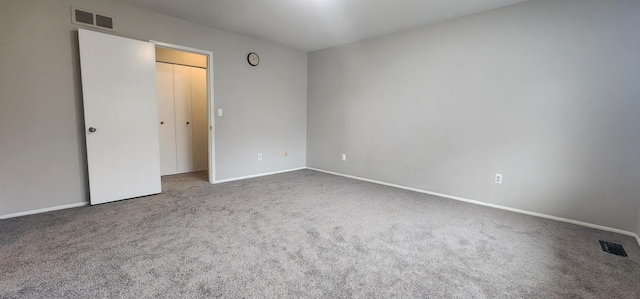 889 Kirts Blvd, Troy, MI 48084 - unfurnished bedroom featuring carpet flooring, baseboards, and visible vents