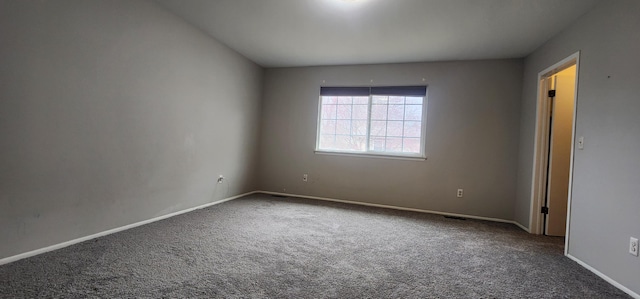 889 Kirts Blvd, Troy, MI 48084 - carpeted empty room featuring baseboards