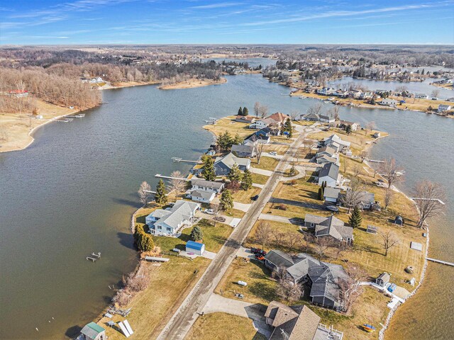 aerial view featuring a water view and a residential view