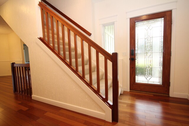 14224 Bridgeview Pointe, Vicksburg, MI 49097 - foyer entrance with hardwood / wood-style floors, baseboards, and stairs
