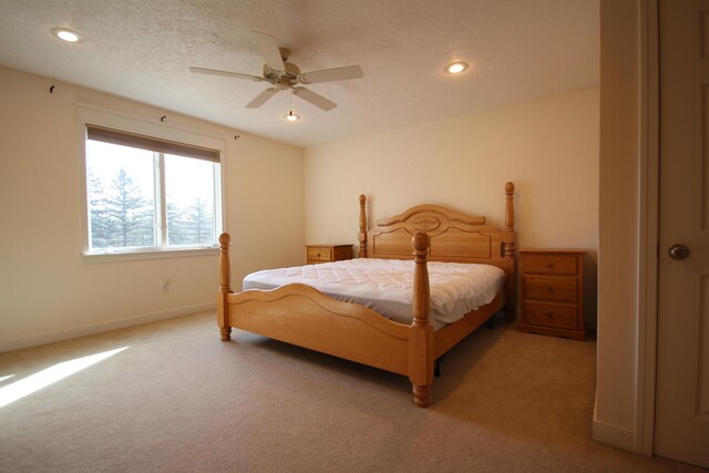 14224 Bridgeview Pointe, Vicksburg, MI 49097 - bedroom featuring light carpet, recessed lighting, baseboards, and a ceiling fan