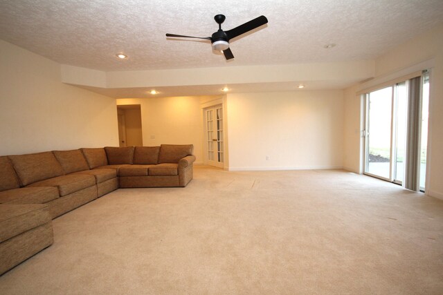 14224 Bridgeview Pointe, Vicksburg, MI 49097 - living area with light colored carpet, a textured ceiling, recessed lighting, baseboards, and ceiling fan