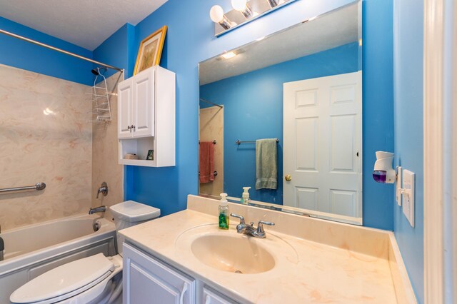1998 Brighton Ln, Portage, MI 49024 - bathroom featuring toilet, vanity, and washtub / shower combination