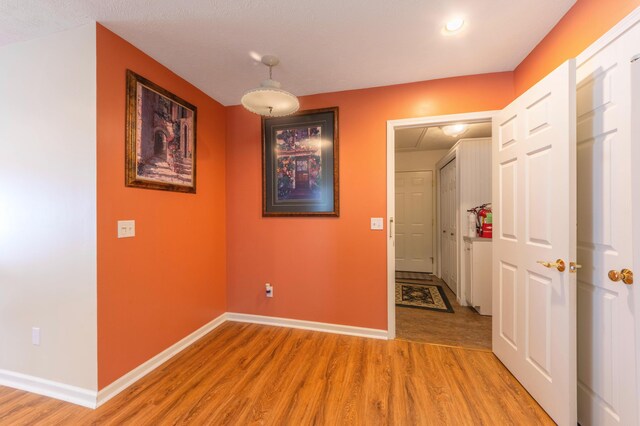 1998 Brighton Ln, Portage, MI 49024 - corridor featuring baseboards and light wood finished floors