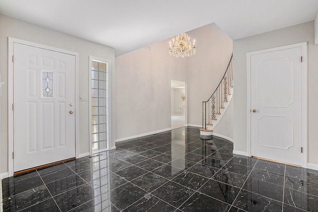 1625 Arlington Blvd, Ann Arbor, MI 48104 - entryway featuring granite floors, stairs, and a chandelier